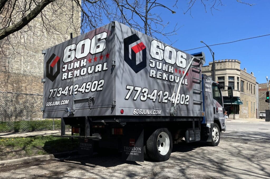 606 junk removal truck on street before services